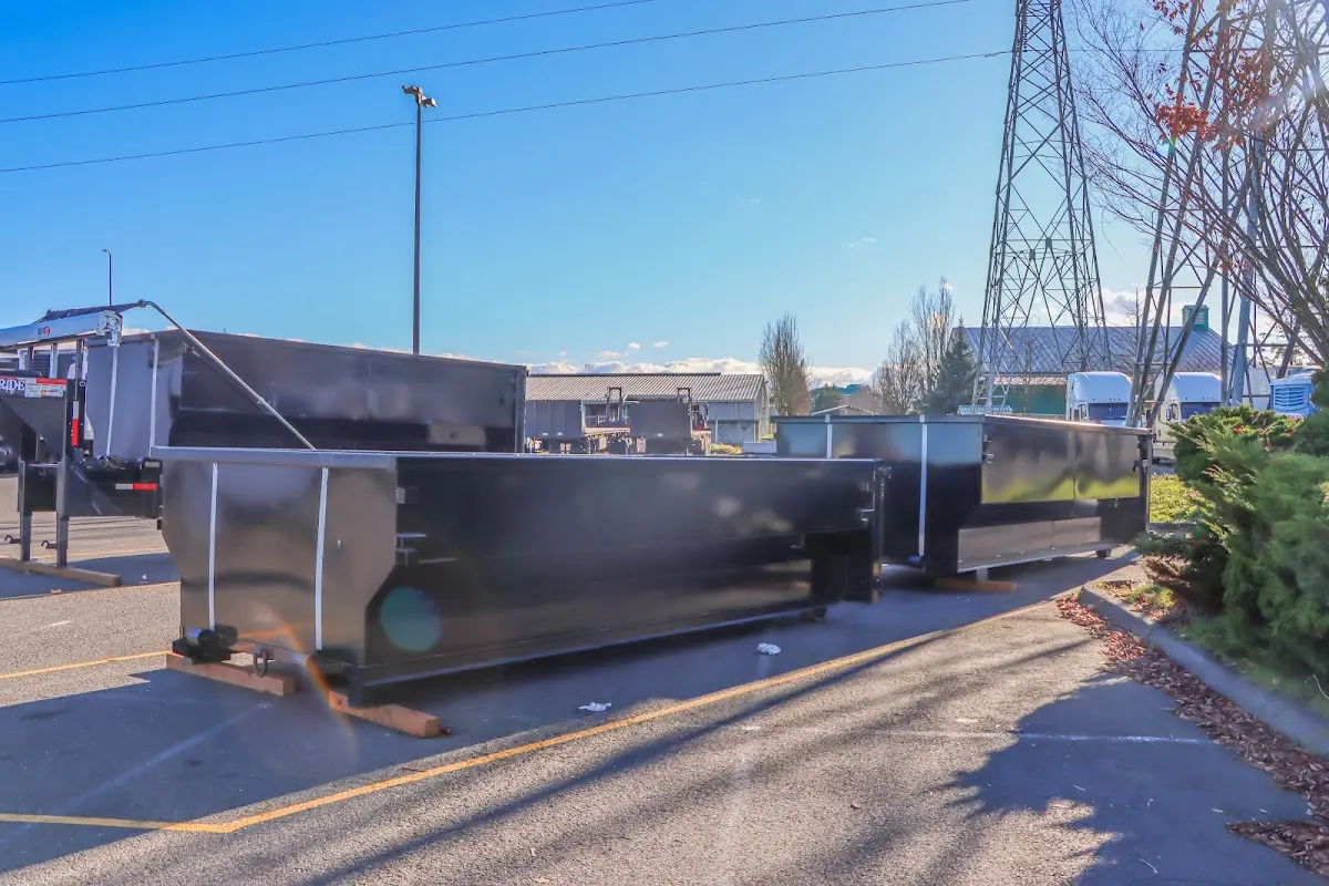 Roll-off dumpster ready for waste disposal at job site for 4 Yard Dumpster Rental in Stillwater